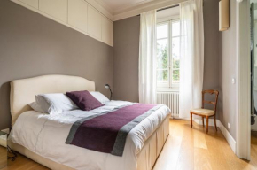 Boutique Apartment with Private Rooms and Garden Oasis